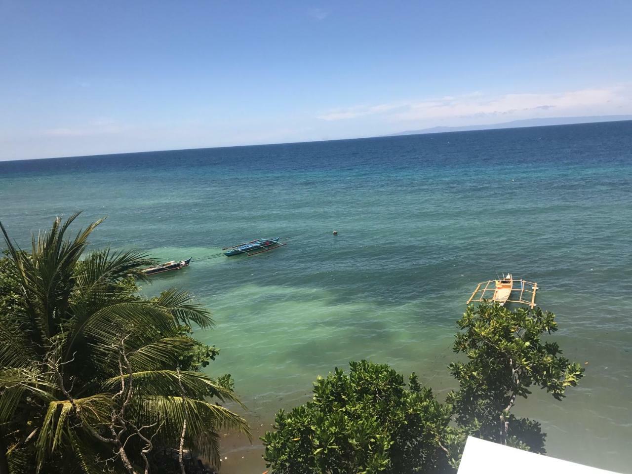 Babylon Oslob Coast Guesthouse Exterior foto